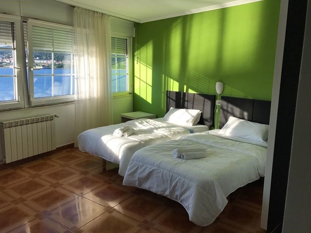 Aparthotel Corcubion Playa De Quenxe 外观 照片